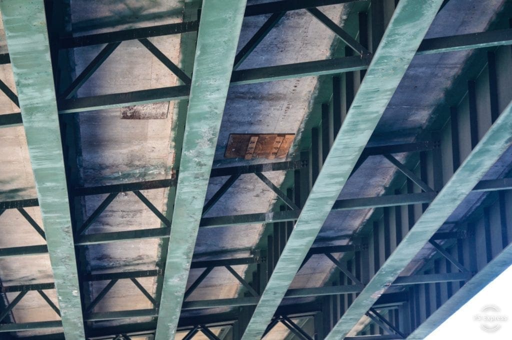 A photo that displayed plywood used to repair an interstate.