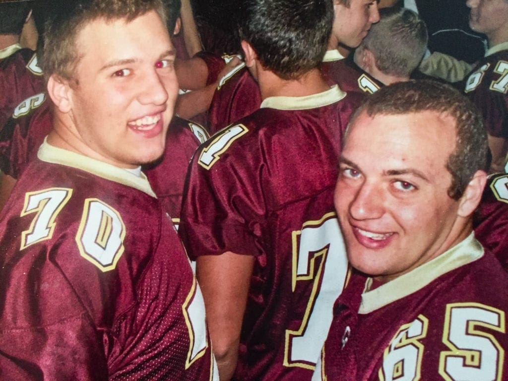 Football players at a pep rally.