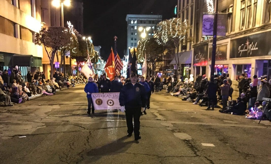 The Americans Legion Post 1 Color Guard leads the Wheeling parade.