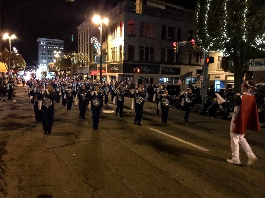 A photo of a high school band in a parade.