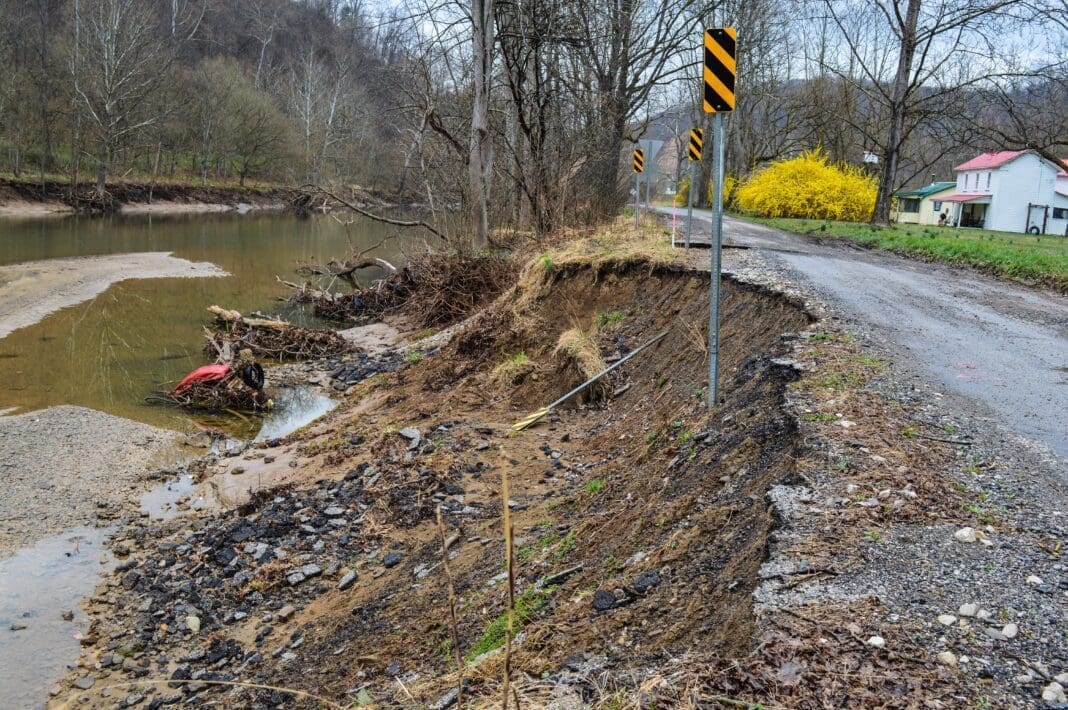 A badly damaged road along Fish Creek in Marshall County.