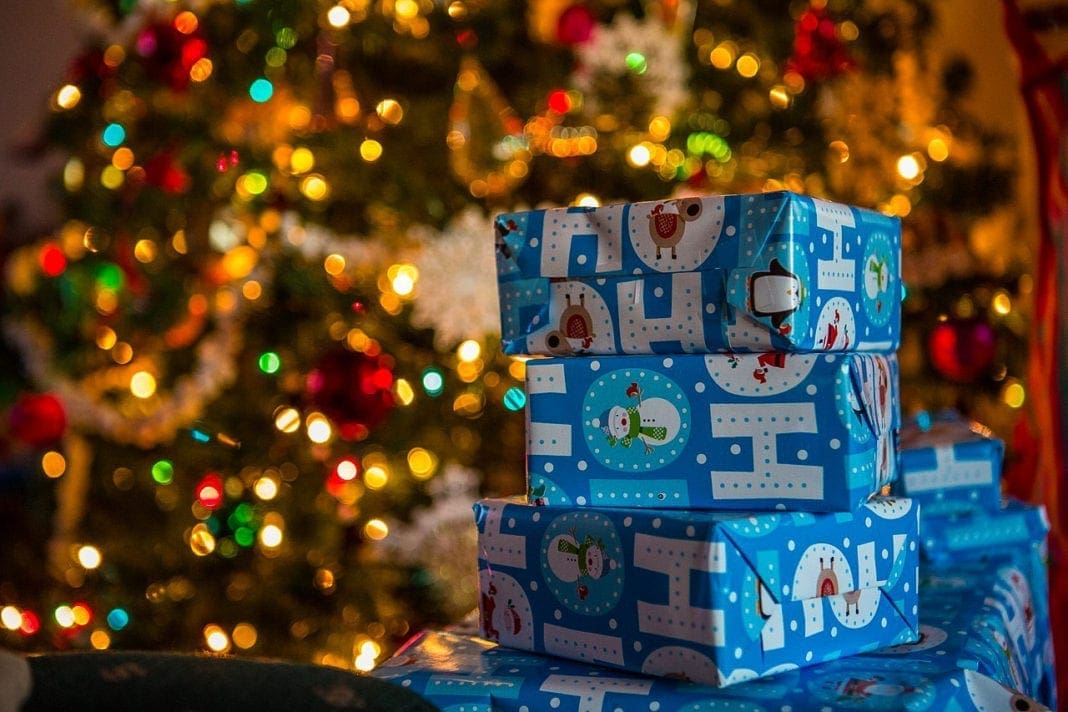 A photo of presents under the tree.