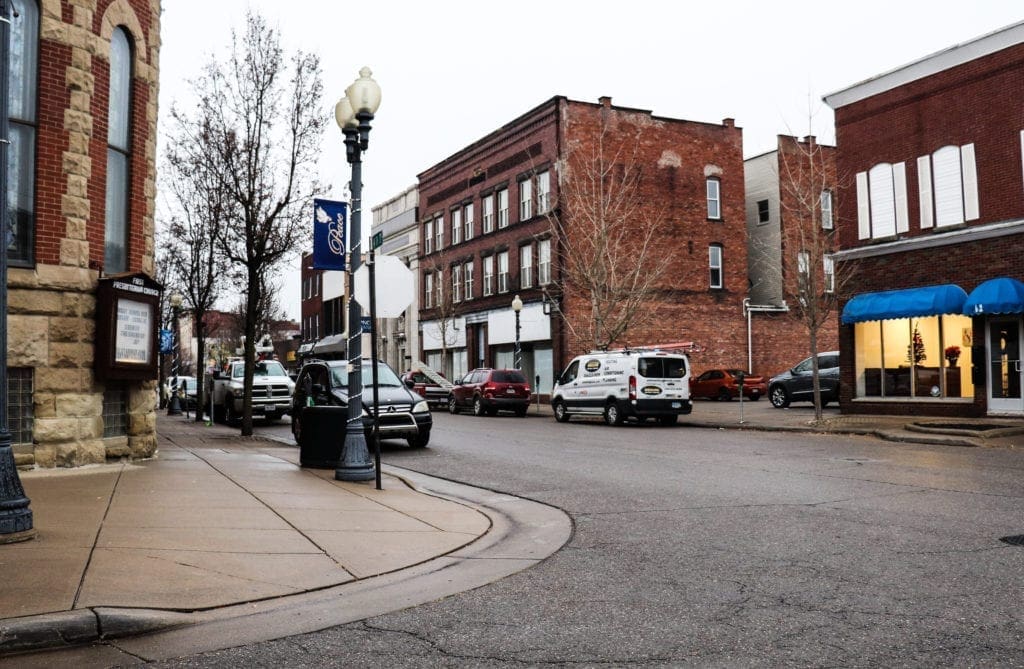 A photo of an intersection of a downtown area.