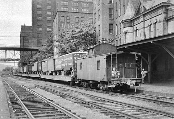 A black-and-white photo of a three-track train yard in Wheeling.