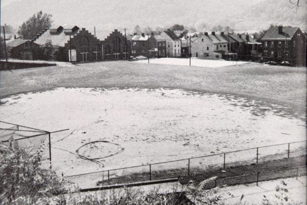 A ballfield in a neighborhood.