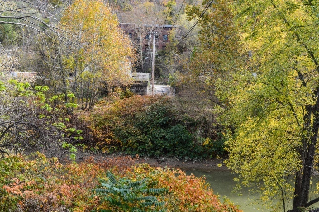 A photo of an area where a bridge was once located.