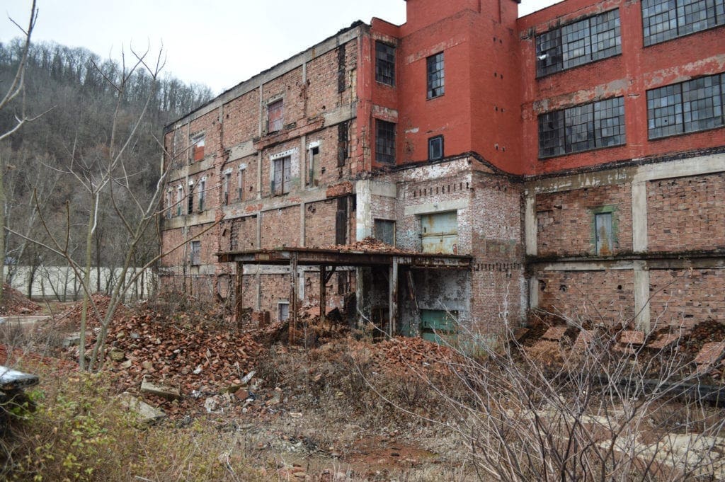 A partially demolished factory.