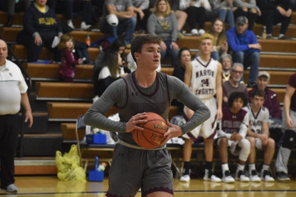 Williamstown basketball player passing the ball.