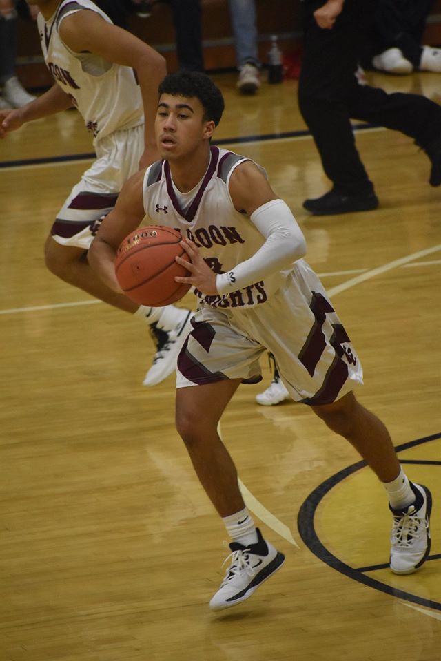 Wheeling Central player passing the ball.