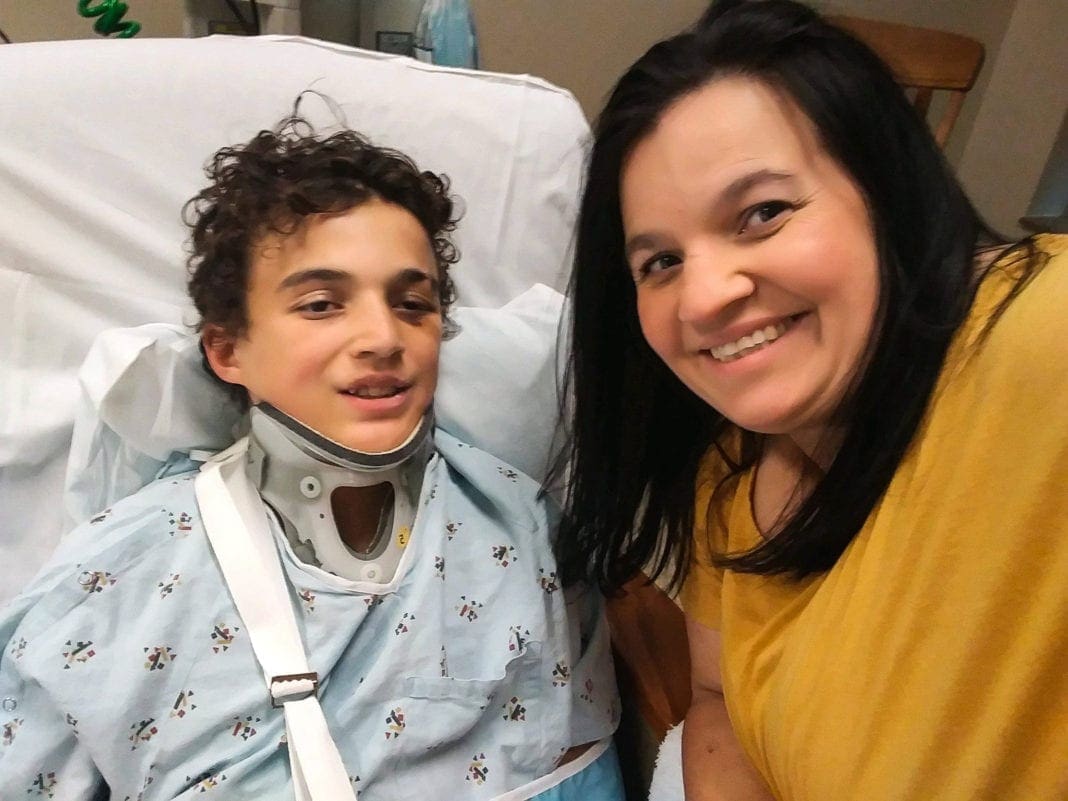 A hospital patient with his mother.