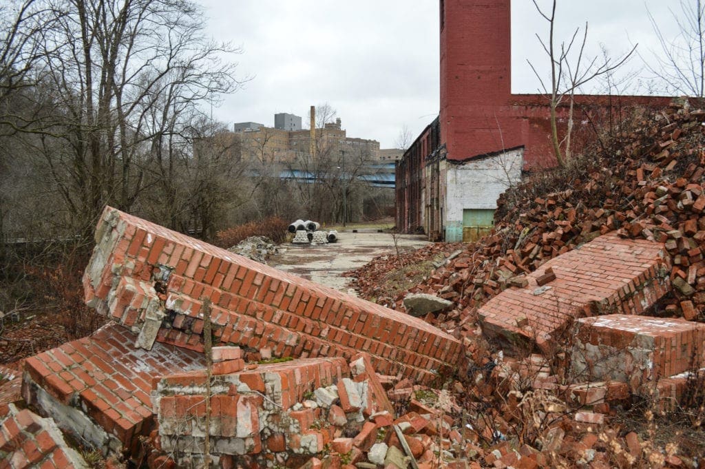 A photo of a dilipated factory area.