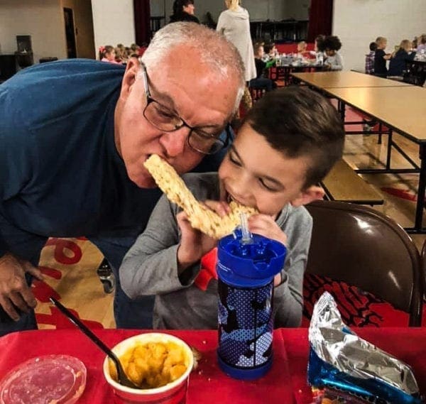 A photo of a grandfather and grandson.