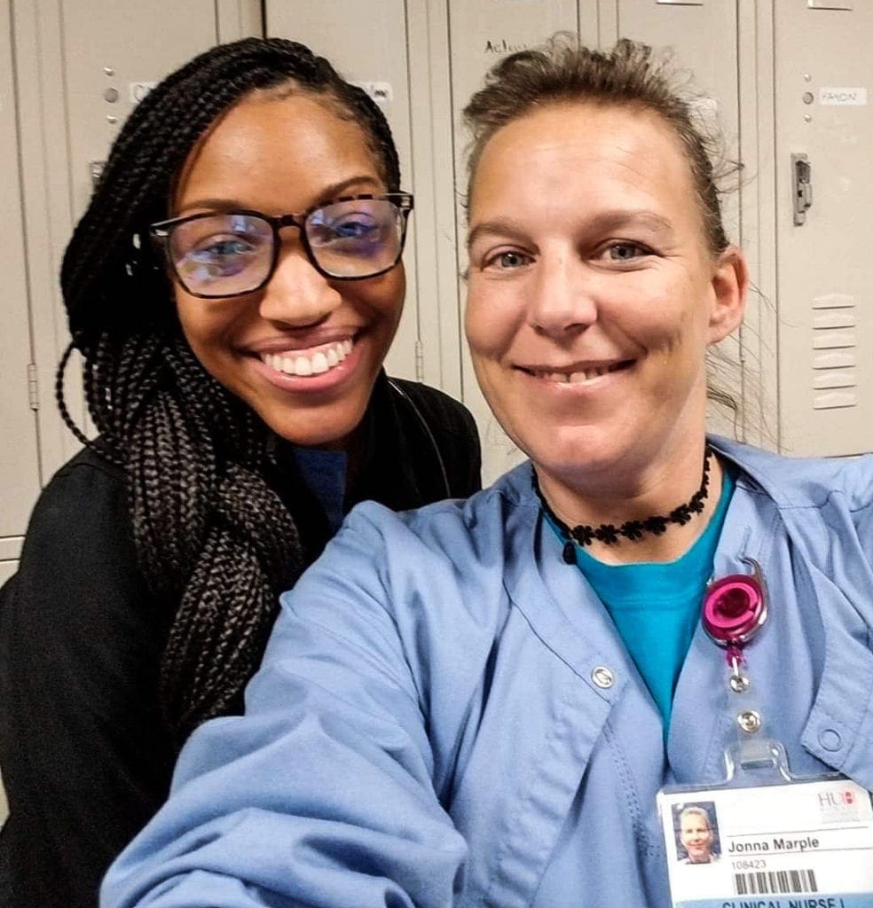 Two female hospital employees.