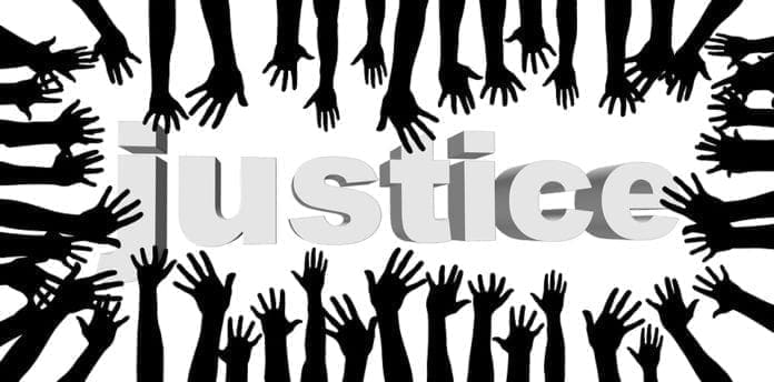 A graphic of hands reaching for justice.