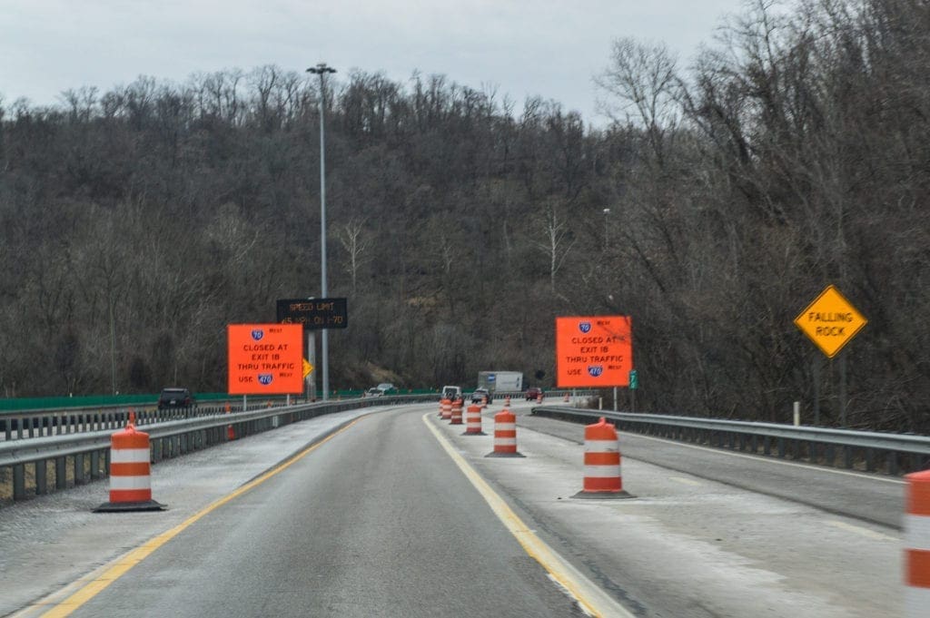 Orange interstate signs along I-70.