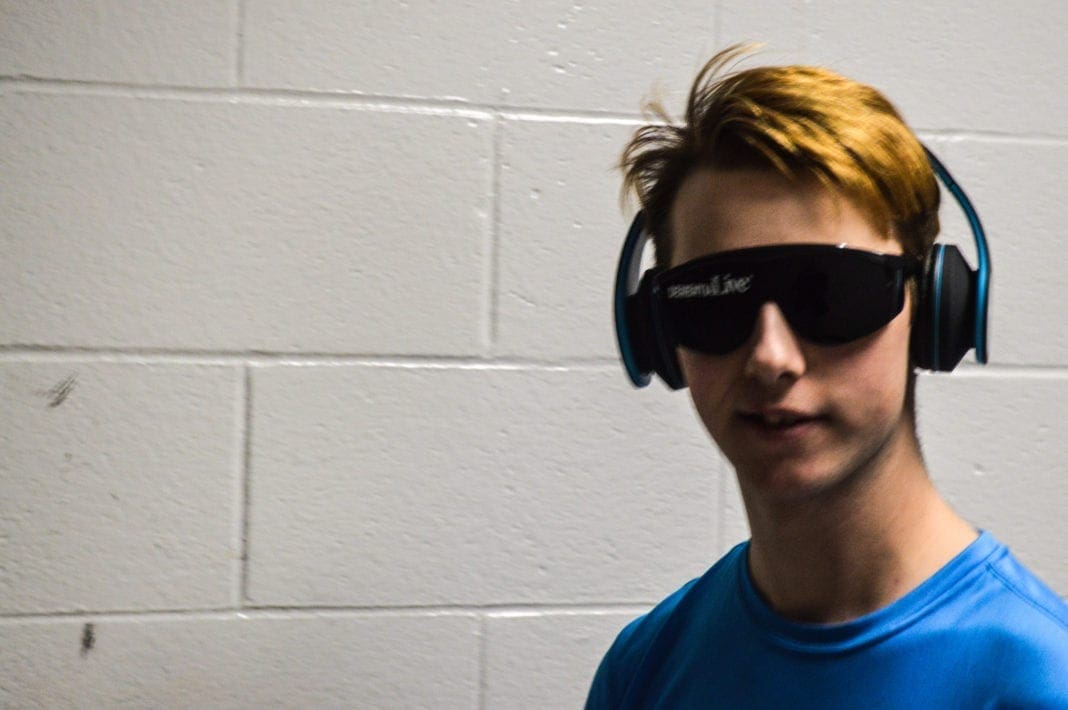 A student wearing Dementia Live glasses.