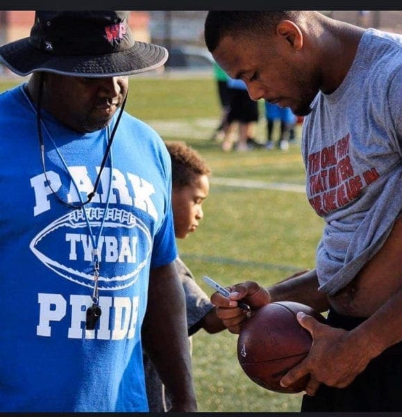 A football coach and a player.