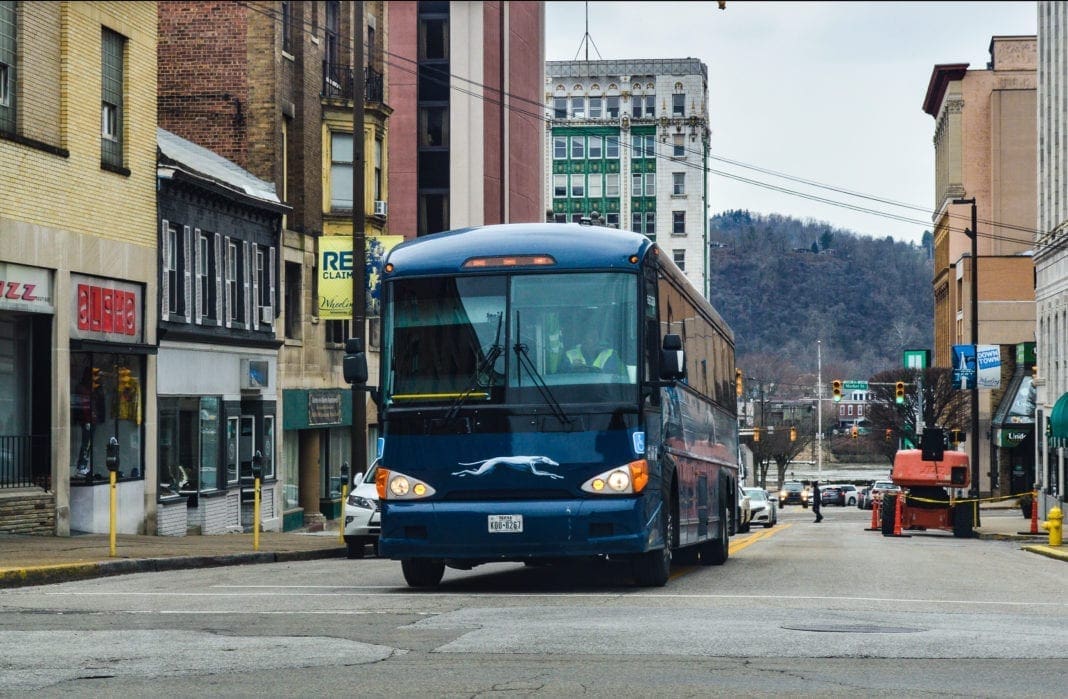 The bus is blue.