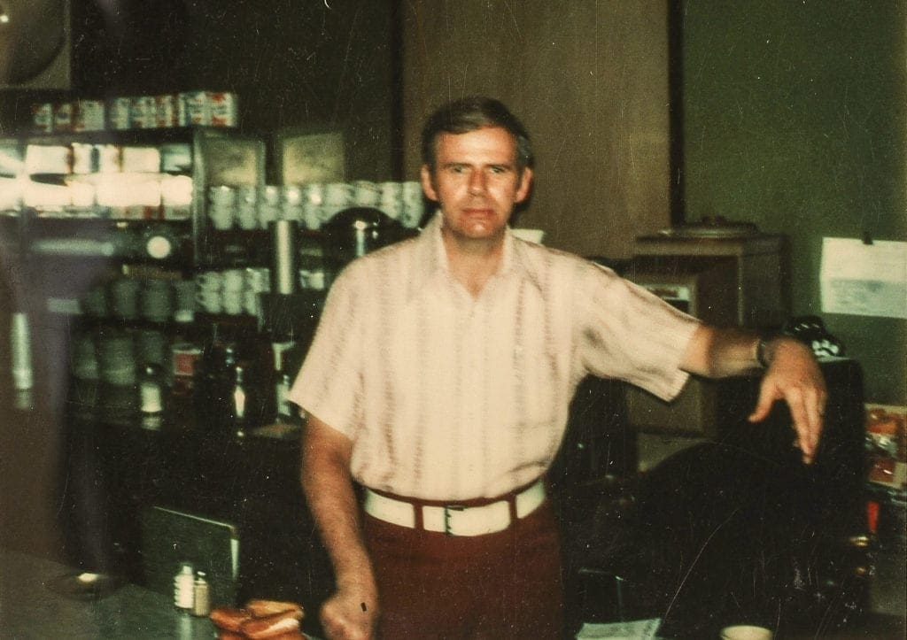 A photo of a shop owner.