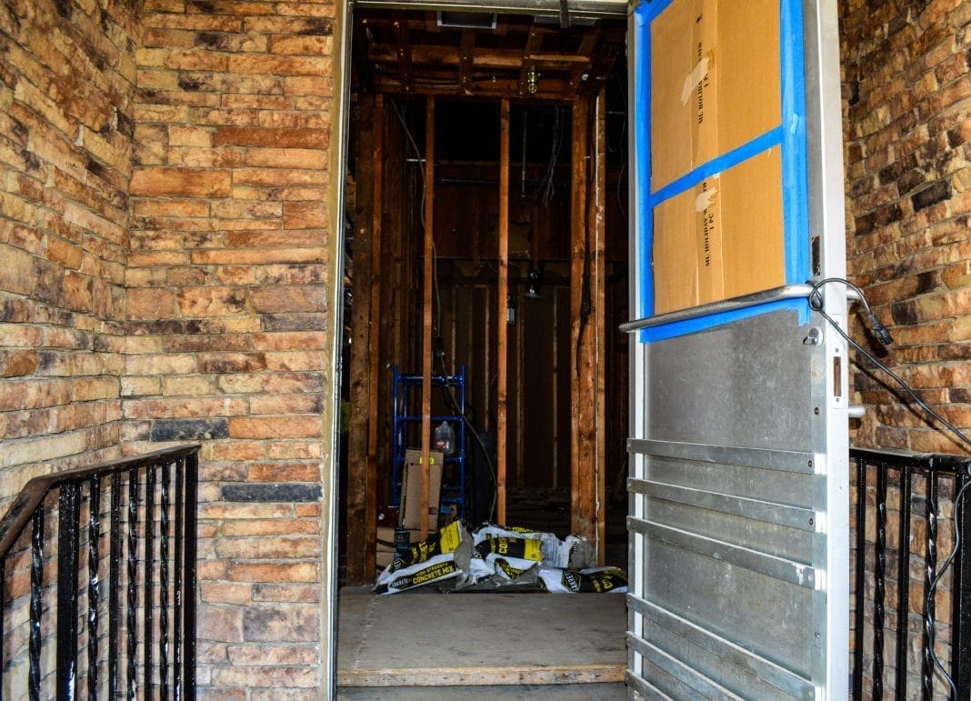 The front door of a former bar.