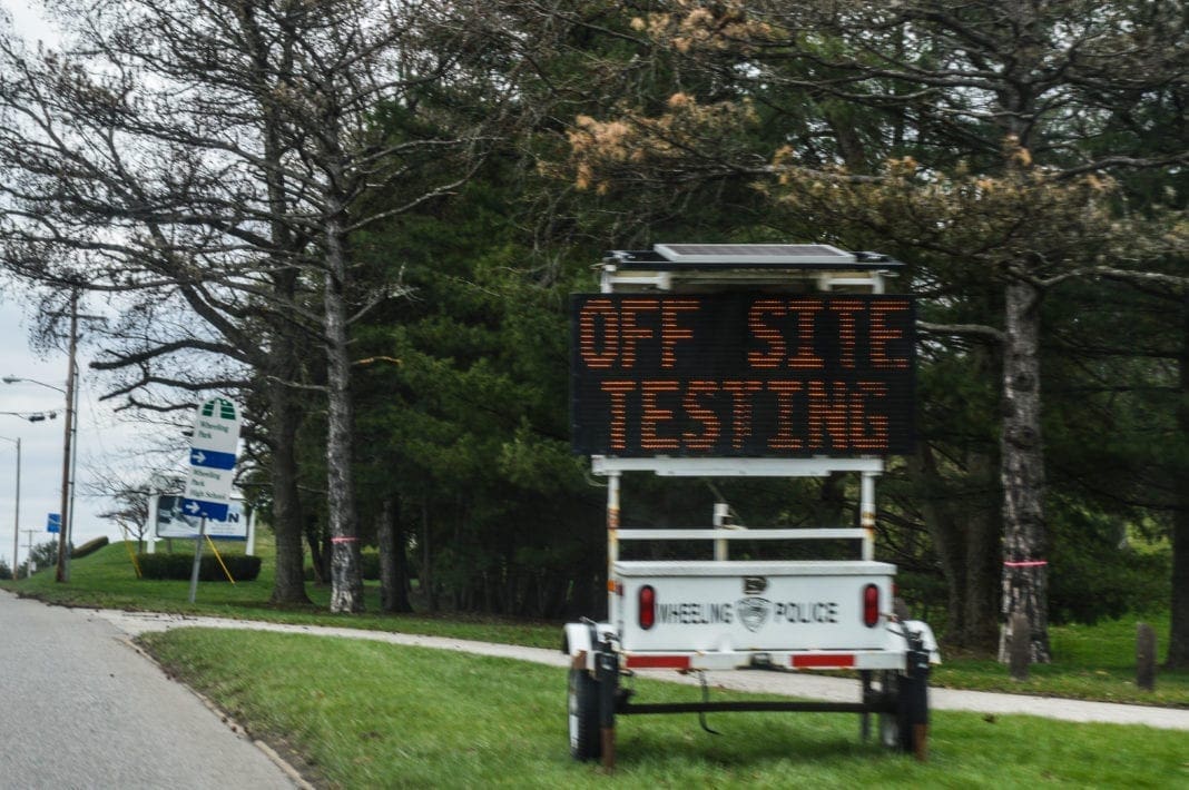 A road sign that reads, "Off Site Testing."