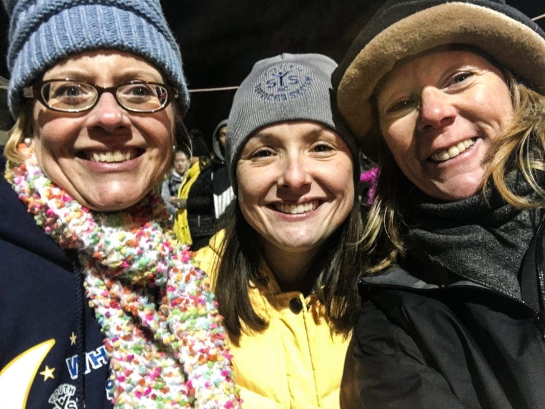 A photo of three ladies.