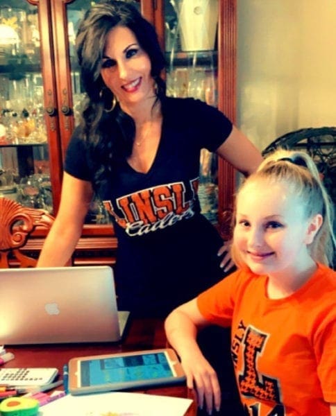 A mother and daughter educating at home.