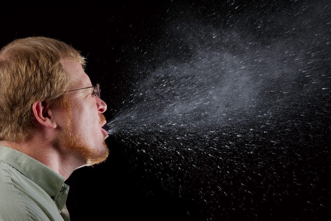 A man sneezing.