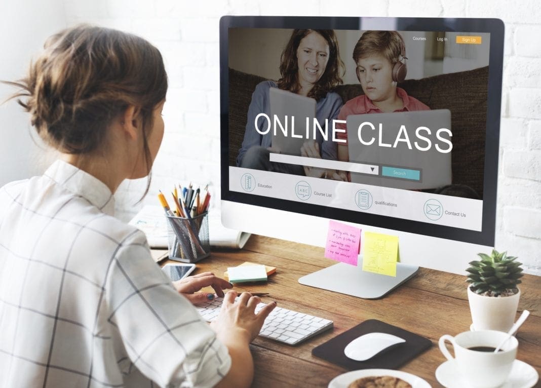 A photo of a female learning online.