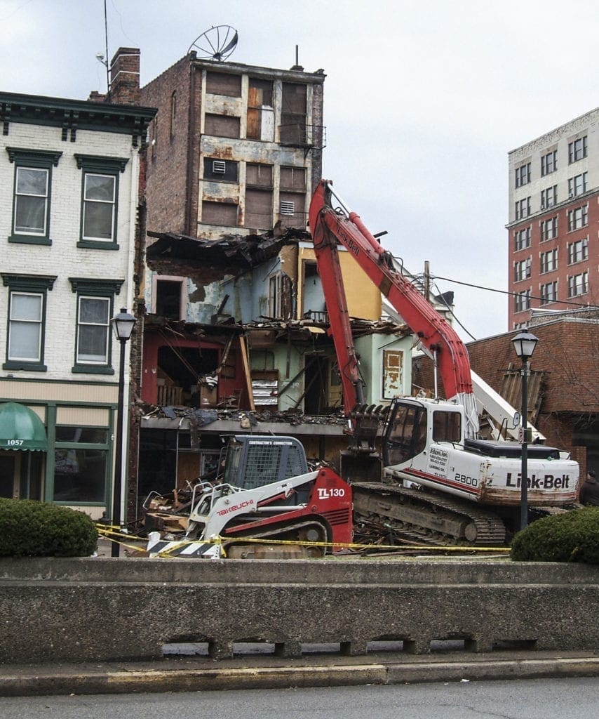 A photo of a building being demolished.