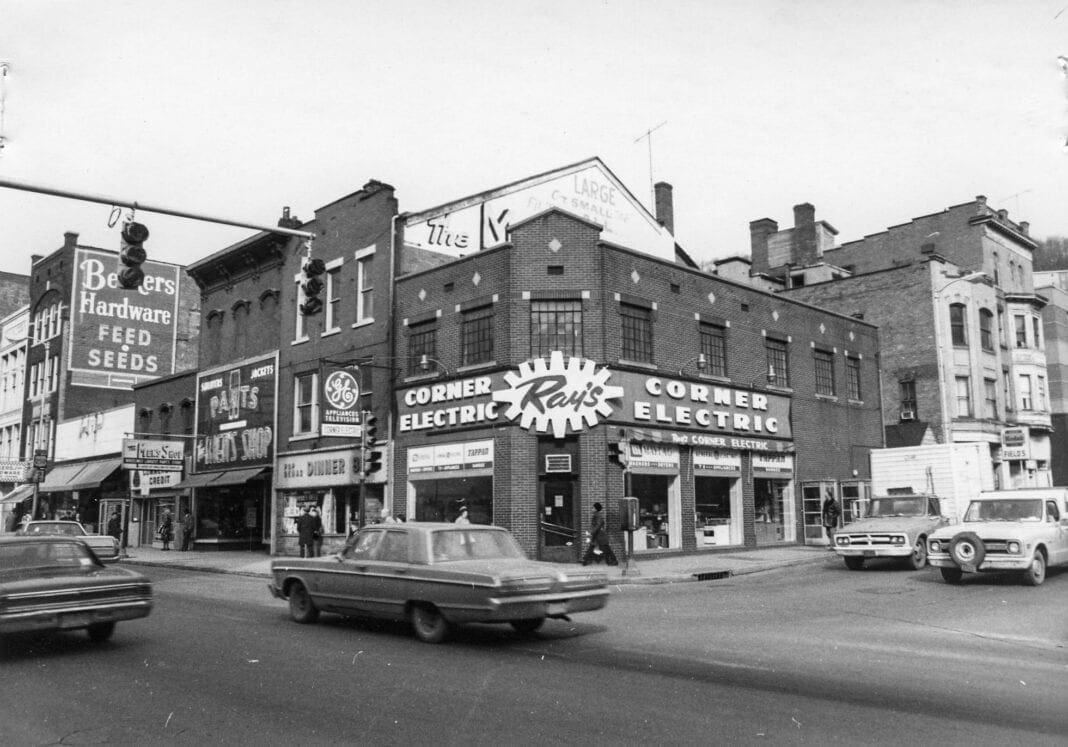 A historic photo of a street croner.