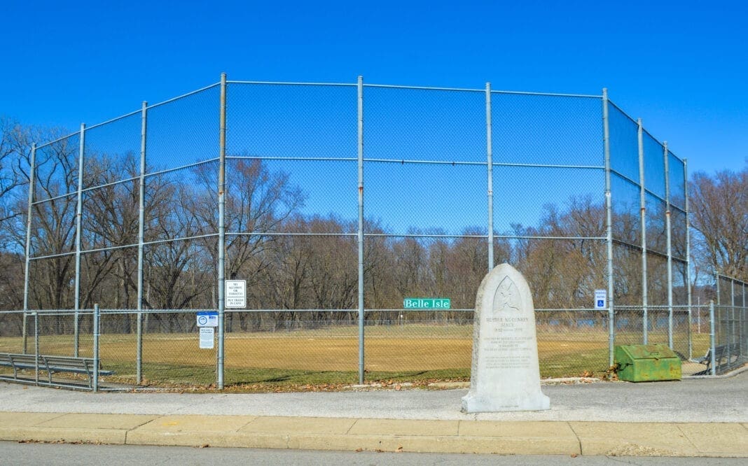 A ball field surrounded by fencing.