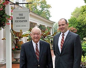 An older man with a younger man.