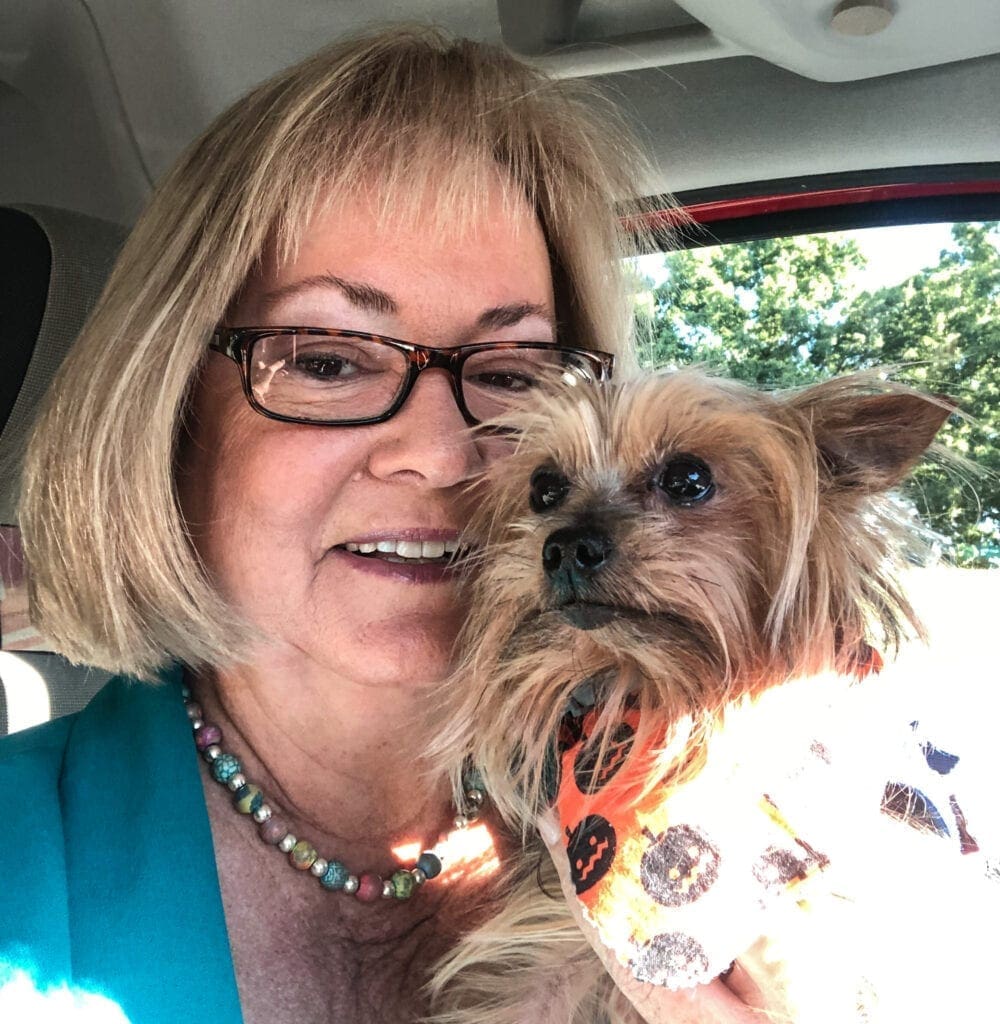 A lady with her pet dog.