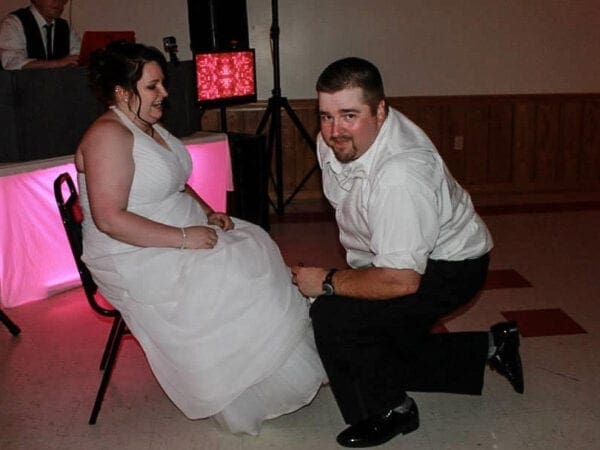 A bride and groom at their wedding reception.