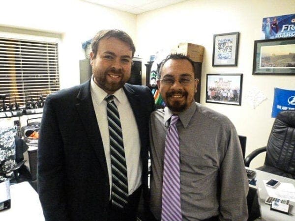 Two men in an office.