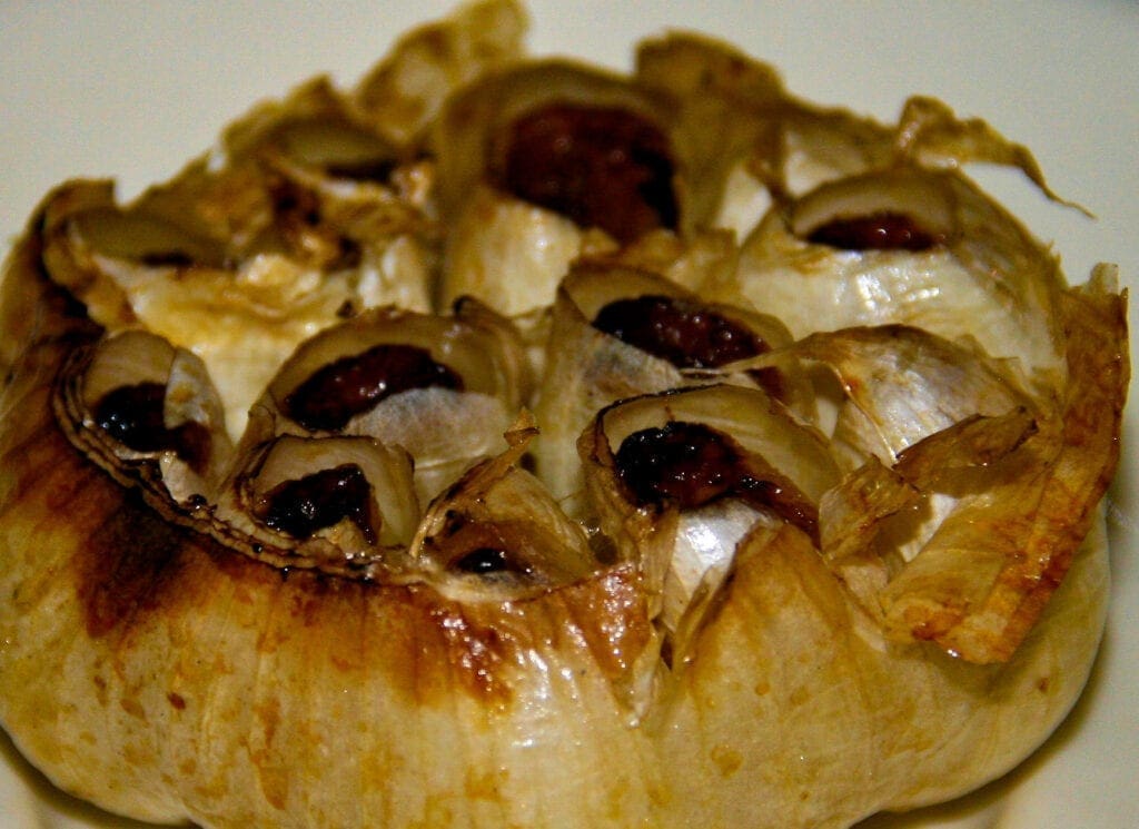 A close up of roasted garlic.