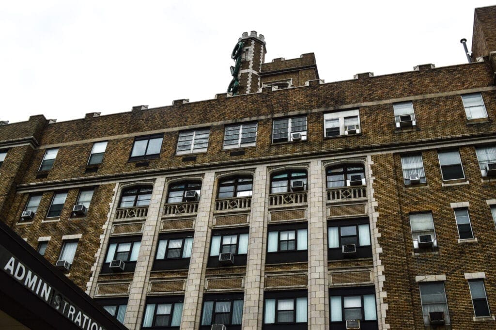 A photo of a historic hospital building.