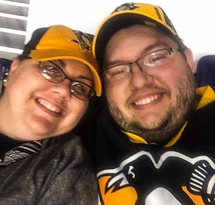 A couple at a sporting event.