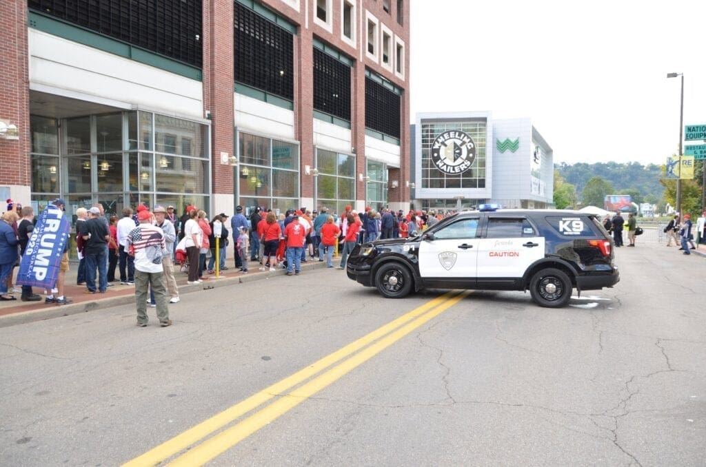 A police cruiser at a political rally.