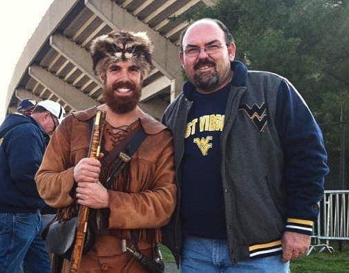 Two men at a WVU football game.