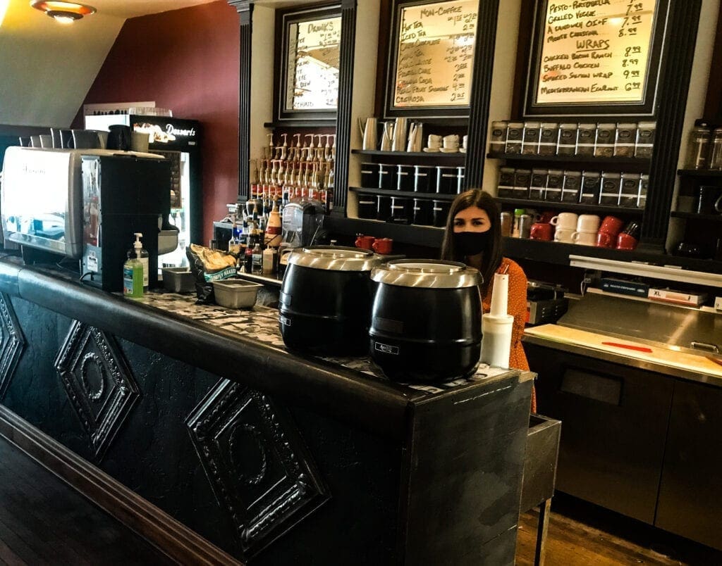 An employee behind a counter.