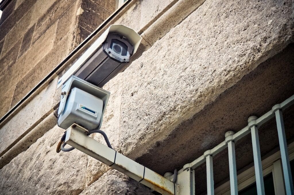 A surveillance camera on a jail.