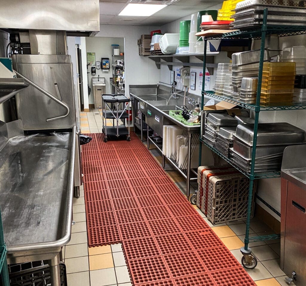 The dishwashing area of a cooking school.