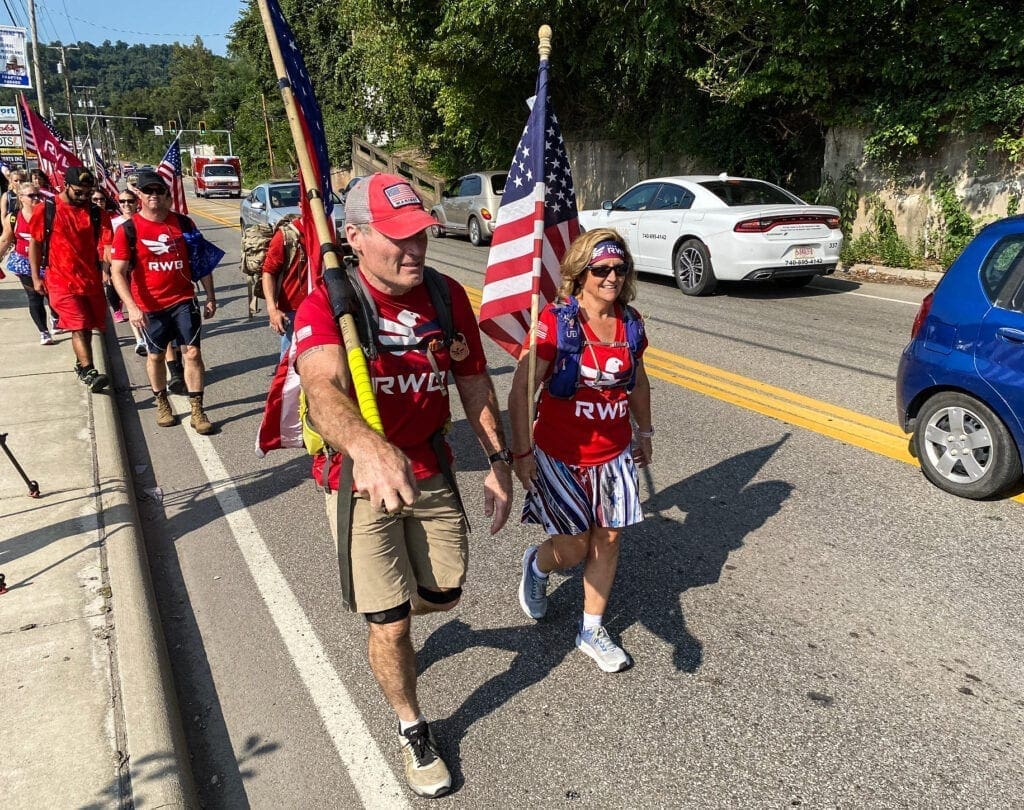 In some areas, the walkers had to use the roadway.