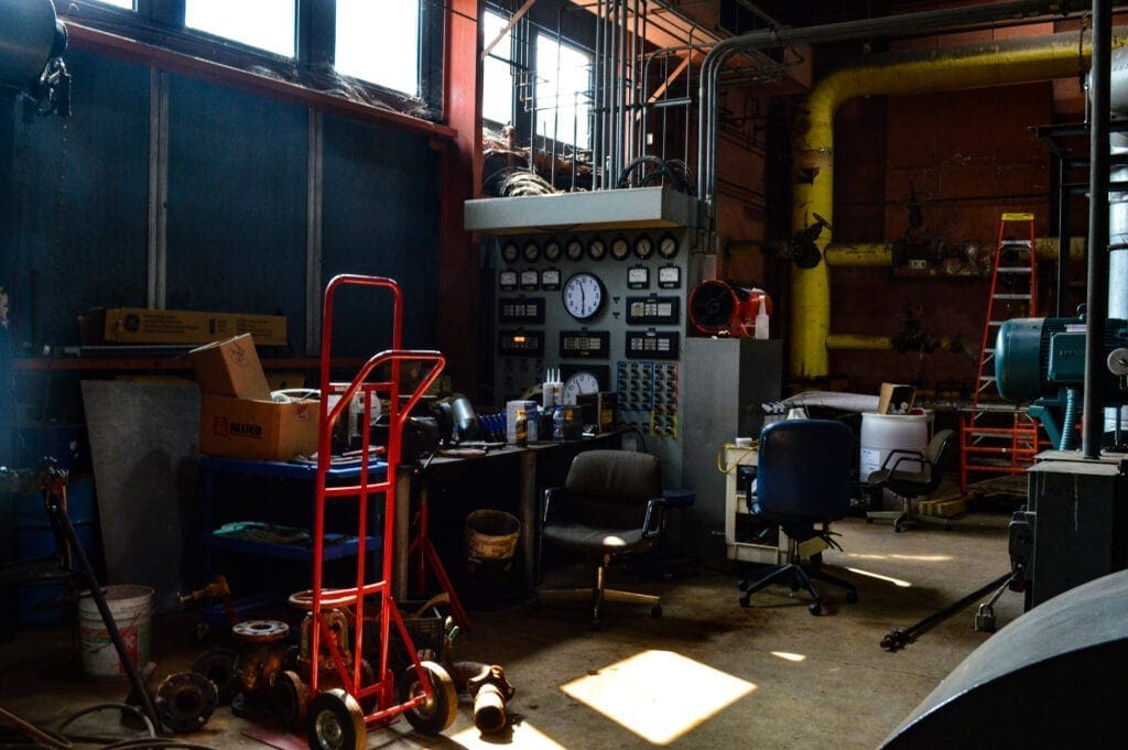 A desk in a boiler room.