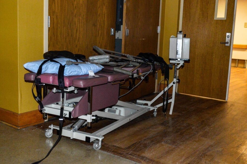 A hospital gurney in a hallways.