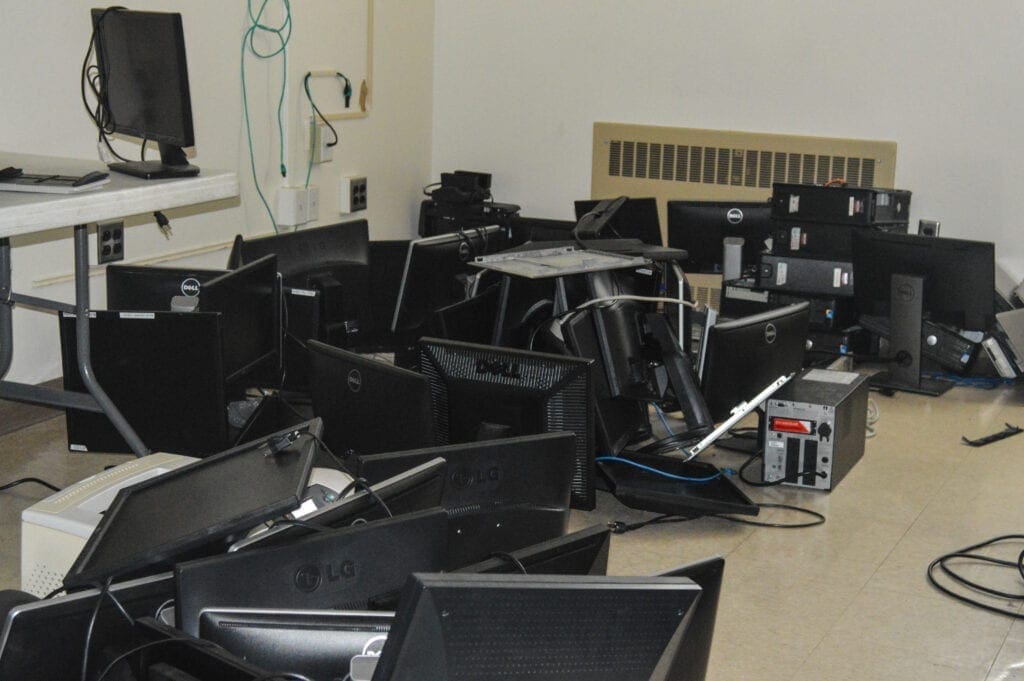 A floor covered in computer screens.