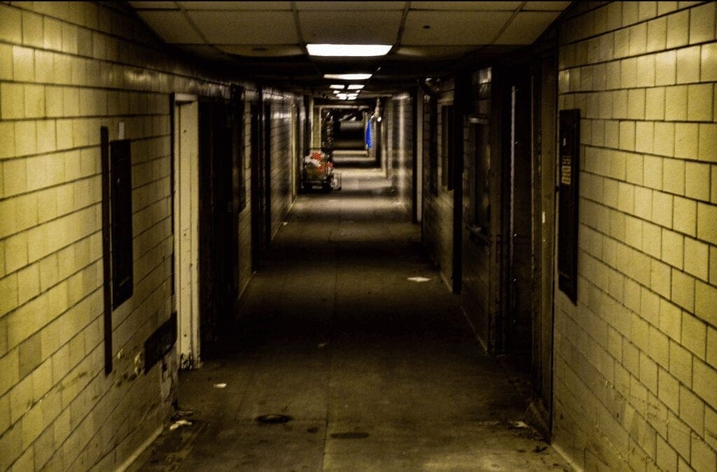 A basement hallway of a hospital.