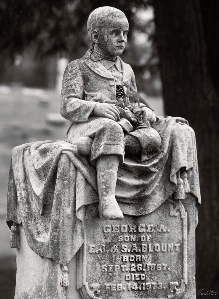 An elaboraste grave stone for a child.